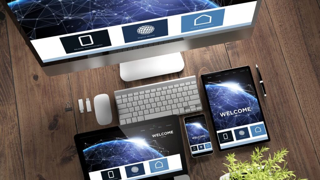 Top down view of a landing page website optimized for different devices mobile responsive.